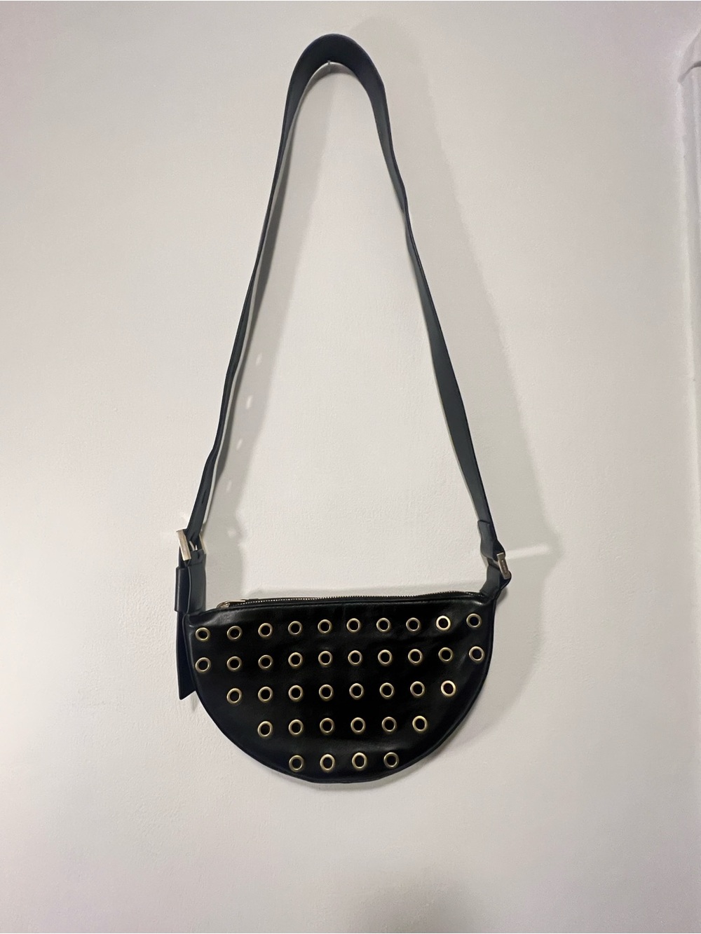 All Saints Half Moon Eyelet Crossbody Bag in Black Leather